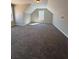 Spacious bedroom with neutral carpet, natural light, and ample room at 90 Hammock Dr, Covington, GA 30016
