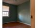 Bedroom with wood floors and a window with natural light at 430 Poole Bridge Rd, Hiram, GA 30141