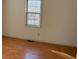 Bedroom with a window and wood floors at 430 Poole Bridge Rd, Hiram, GA 30141