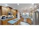 Well-equipped kitchen with a center island, stainless steel appliances, and ample counter space at 6054 Nebo Rd, Hiram, GA 30141