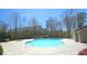 Community pool featuring clear, blue water and concrete deck, perfect for relaxing and soaking up the sun at 3034 Liberty Nw Way, Atlanta, GA 30318