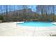 Community pool featuring clear, blue water and concrete deck, perfect for relaxing and soaking up the sun at 3034 Liberty Nw Way, Atlanta, GA 30318