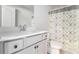 Bathroom vanity with a granite countertop, cabinet, and view of the shower and toilet at 11948 Brightside Pkwy, Hampton, GA 30228