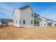 Home's backyard featuring newly seeded lawn and a covered patio area at 735 Crossroad Sw Ct, Powder Springs, GA 30127
