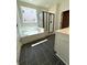 Contemporary bathroom boasts soaking tub and glass enclosed shower at 735 Crossroad Sw Ct, Powder Springs, GA 30127