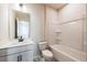 A full bathroom featuring a shower/tub combo, toilet, and vanity with sink and vanity lighting at 735 Crossroad Sw Ct, Powder Springs, GA 30127