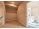 Walk-in closet providing ample storage and organization at 735 Crossroad Sw Ct, Powder Springs, GA 30127