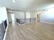 Open loft area featuring hardwood floors, a neutral color palette and railing at 735 Crossroad Sw Ct, Powder Springs, GA 30127