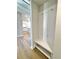 Welcoming mudroom with storage bench and hooks at 735 Crossroad Sw Ct, Powder Springs, GA 30127