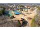 Aerial view of community amenities including tennis courts, pool, playground, and gazebo at 4118 Lost Springs Trl, Douglasville, GA 30135
