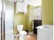 Basement bathroom with shower, toilet and vanity at 4118 Lost Springs Trl, Douglasville, GA 30135