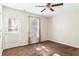 Cozy bedroom with backyard access and neutral decor at 4118 Lost Springs Trl, Douglasville, GA 30135
