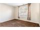 Well-lit bedroom with neutral walls and carpet at 4118 Lost Springs Trl, Douglasville, GA 30135