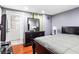 Basement bedroom with wood floors and ample closet space at 4118 Lost Springs Trl, Douglasville, GA 30135