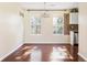 Bright dining room with hardwood floors and large windows at 4118 Lost Springs Trl, Douglasville, GA 30135