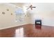 Vaulted ceiling living room with hardwood floors and a fireplace at 4118 Lost Springs Trl, Douglasville, GA 30135