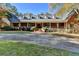 Brick home with a large front porch and long driveway at 2701 Stilesboro Nw Ln, Acworth, GA 30101