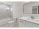 Bathroom offers a vanity sink and tub with tiled walls at 38 Puckett Se Rd, Emerson, GA 30137