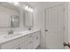 Bathroom features a double sink vanity with white cabinets at 38 Puckett Se Rd, Emerson, GA 30137