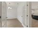 Bright home office with french doors and view to dining nook and kitchen at 38 Puckett Se Rd, Emerson, GA 30137
