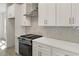 Modern kitchen with quartz countertops, stainless steel appliances, and a stylish backsplash at 38 Puckett Se Rd, Emerson, GA 30137