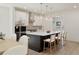 Modern kitchen featuring an island with seating, stainless steel appliances, and pendant lighting at 38 Puckett Se Rd, Emerson, GA 30137