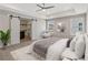 Main bedroom with a ceiling fan and barn door leading to closet at 38 Puckett Se Rd, Emerson, GA 30137