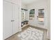Convenient mud room featuring a bench, storage, and easy access to the outdoors at 38 Puckett Se Rd, Emerson, GA 30137