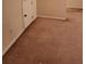 The basement has neutral walls, carpeted floor, and a closet at 424 Village Way, Loganville, GA 30052
