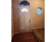 Welcoming front foyer featuring a white front door and a small side window at 424 Village Way, Loganville, GA 30052