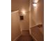 Carpeted stairway with handrails and lighting, leading to the upper level at 424 Village Way, Loganville, GA 30052