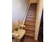 Carpeted stairway with lift assistance at 424 Village Way, Loganville, GA 30052