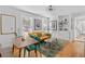 Bright living room with hardwood floors, mustard sofa, and mid-century modern furniture at 764 Edgewood Ne Ave # 1, Atlanta, GA 30307