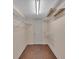 Walk-in closet with shelving for storage and organization at 36 Latimer Nw Ln, Cartersville, GA 30121