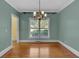 The dining room has hardwood floors, crown molding and natural light at 36 Latimer Nw Ln, Cartersville, GA 30121