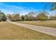 A traditional home features a long driveway and large front yard at 36 Latimer Nw Ln, Cartersville, GA 30121