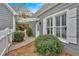 Charming home exterior featuring a covered entrance and well-maintained landscaping at 36 Latimer Nw Ln, Cartersville, GA 30121