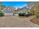 Charming home exterior with gray siding, attached garage and well-manicured landscaping at 36 Latimer Nw Ln, Cartersville, GA 30121