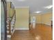 Spacious foyer with hardwood floors and staircase leading to upper level, adjacent to formal living room at 36 Latimer Nw Ln, Cartersville, GA 30121