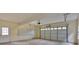 Spacious two car garage with an insulated garage door, side entry door, and pegboard at 36 Latimer Nw Ln, Cartersville, GA 30121