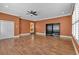 Spacious living room with hardwood floors, ceiling fan and view into the kitchen at 36 Latimer Nw Ln, Cartersville, GA 30121