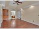 Large primary bedroom featuring hardwood floors, tray ceilings, and plenty of space at 36 Latimer Nw Ln, Cartersville, GA 30121