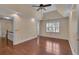 Large bedroom with hardwood floors, ceiling fan, and a window providing natural light at 36 Latimer Nw Ln, Cartersville, GA 30121