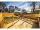 Spacious wooden deck overlooking a fenced backyard at 1110 Mcdaniel Sw St, Atlanta, GA 30310