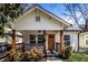 Charming craftsman bungalow with a welcoming front porch and landscaped yard at 1110 Mcdaniel Sw St, Atlanta, GA 30310