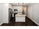 Modern kitchen with island, stainless steel appliances, and granite countertops at 1110 Mcdaniel Sw St, Atlanta, GA 30310