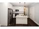 Spacious kitchen with island, stainless steel appliances, and granite countertops at 1110 Mcdaniel Sw St, Atlanta, GA 30310