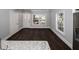 Bright living room featuring hardwood floors and large windows at 1110 Mcdaniel Sw St, Atlanta, GA 30310