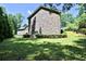 House exterior showcasing stonework and landscaping at 716 Counsel Ne Dr, Marietta, GA 30068