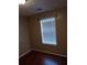 Bedroom featuring a window with blinds at 6579 Alford Way, Lithonia, GA 30058